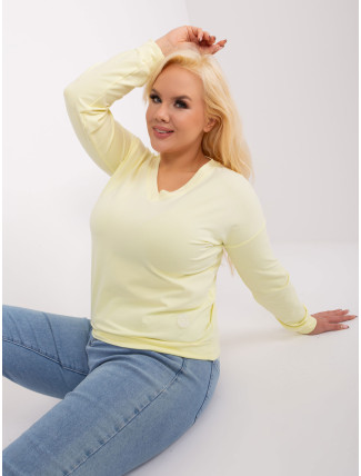 Světle žlutá halenka plus size s nášivkou